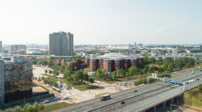 Luchtfoto van het Boehringer-terrein in een stedelijke omgeving, omringd door gebouwen, groen en een snelweg op de voorgrond.
